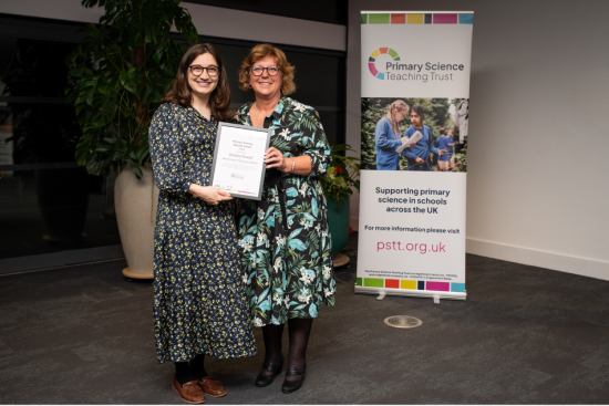 Winner Debbie Powell with her certificate with Julia Ryle-Hodges, Board member of PSTT