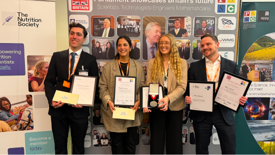 Four STEM for BRITAIN winners stand side by side holding their certificates